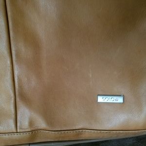 Leather rolling briefcase